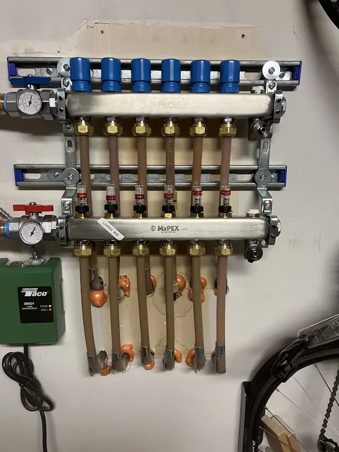 Plumber performing Water Heater Repair at a residential property in Doolittle